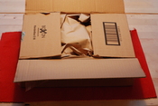A box containing a Soekris net5501-70.